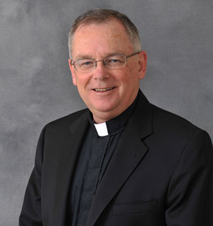 Rev John Denning, CSC