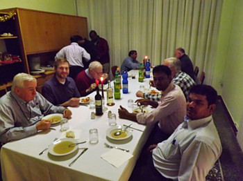 Members of the Holy Cross Forum share dinner with the Superior General