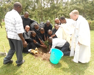 The newly professed in East Africa and their staff plant a tree to celebrate their Novitiate year