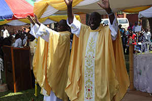 Newly Ordained Fr Arnold Jawiambe, CSC, and Fr Linus Nviiri, CSC