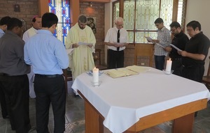 Fr John Phalen, CSC, receives the new novices into the Novitiate