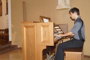 Fr Dennis Strach II, CSC, Plays The Organ At Liturgy For The General Chapter