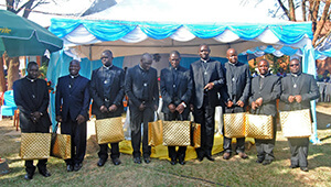 The nine Newly Ordained receive their gifts in the celebration after their Ordinations
