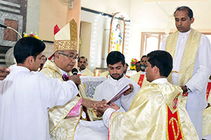 Fr Rajesh Pasanna Has His Hands Anointed In The Ordination Rite