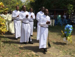 The five to profess Final Vows enter the Mass in Ghana