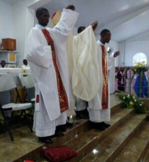 Bishop Yves-Marie Pean, CSC, presents the newly ordained deacons to the assembly
