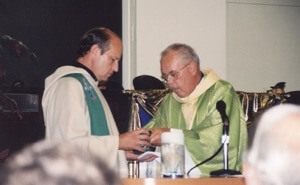 Fr Laurence Olszewski, CSC, celebrates the first Mass in the new parish in 2001