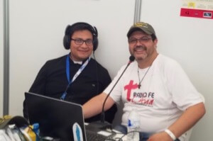 Seminarian Gabriel Fuentes, CSC, does a radio interview at WYD
