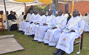 The six men who were ordained (from left to right): Agapetus Mukabane, CSC, Rogers Kakeeto, CSC, John Mwesige, CSC, Sebastian Mulinge, CSC, Francis Mukasa, CSC, and Alex Okidi, CSC