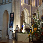 Fr. Romuald Fresnais, CSC, leads prayer in Notre-Dame de Sainte-Croix as part of the shrine's inauguration.