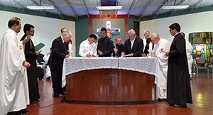 Witnesses signing documents for first profession of vows
