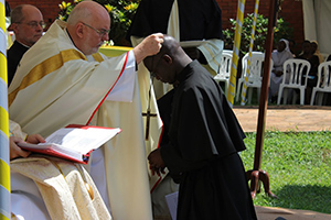Fr O'Hara gives the Final Profession Cross