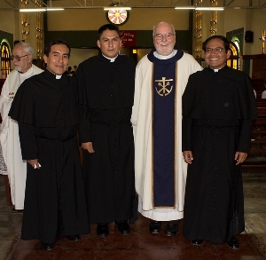 Fr O'Hara takes a picture with the three newly finally professed members of the Congregation in Peru