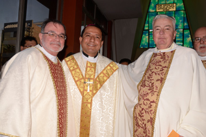 Bishop Izaguirre with Fr Arthur Colgan, CSC, and Fr Richard Warner, CSC