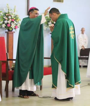 Bishop Talamantes Prays Over Fr Ledezma In His Installation As Pastor Of La Luz