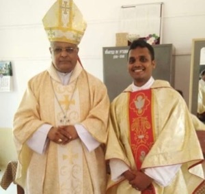 Fr Wilfred Dias, CSC, and Bishop Derek Fernandes