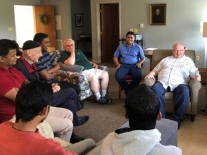 Fr Robert Epping, CSC, Superior General, speaks with the brothers during their program