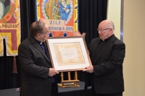 The Superior General congratulates Fr Labine for receiving the Pro Ecclesia et Pontifice Award from Pope Francis