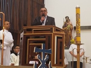 Br Ronaldo speaks at the Eucharistic celebration to commemorate the 75 years