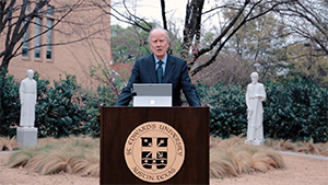 Dr. George Martin, Ph.D., president of St, Edward’s University, dedicated to the Brothers of Holy Cross a campus prayer garden