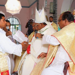 Fr. Anthoni Reddy, C.S.C., from the South India Province makes his promise of obedience to the Most Rev. Bhagyaiah, D.D.