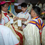 The newly ordained, Fr. Friny Peter, C.S.C., receiving his chalice at St. Joseph Cathedral in Impahl, India.