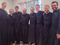 Eight Men Professed their First Vows in Holy Cross