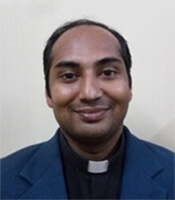 Fr Binoy Johns, CSC