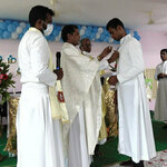 Fr. Panneer Selvam, C.S.C., Vicariate Superior of Tamil Nadu, presented Mr. Joseph Inbaraj, A., C.S.C with his profession cross.